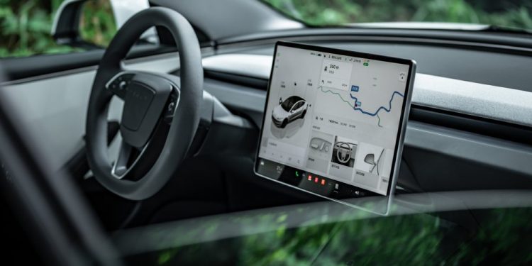 Tesla Influencers Clash Over Controversial Shift in Full Self-Driving Ownership
